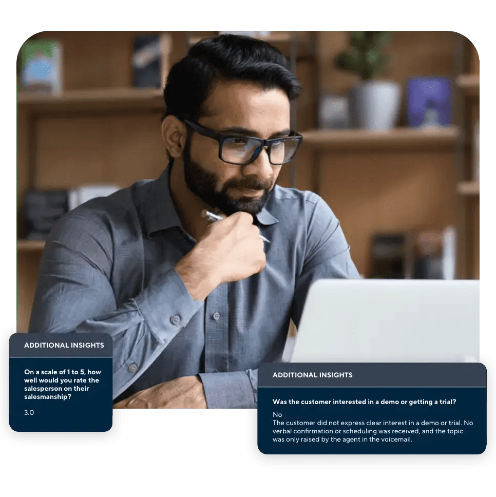 Focused man reviewing call insights on his laptop, including salesperson rating and customer interest analysis overlays.
