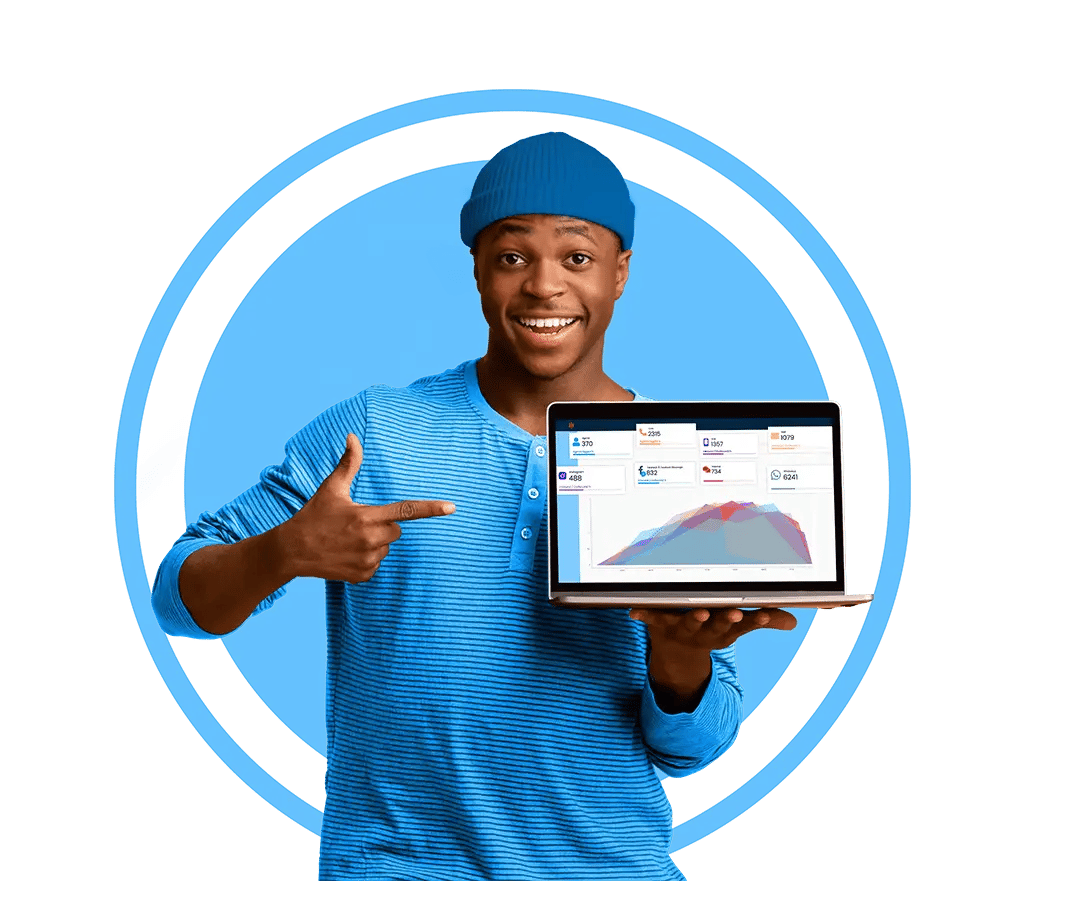 net2phone - man holding laptop and pointing at screen with graphs
